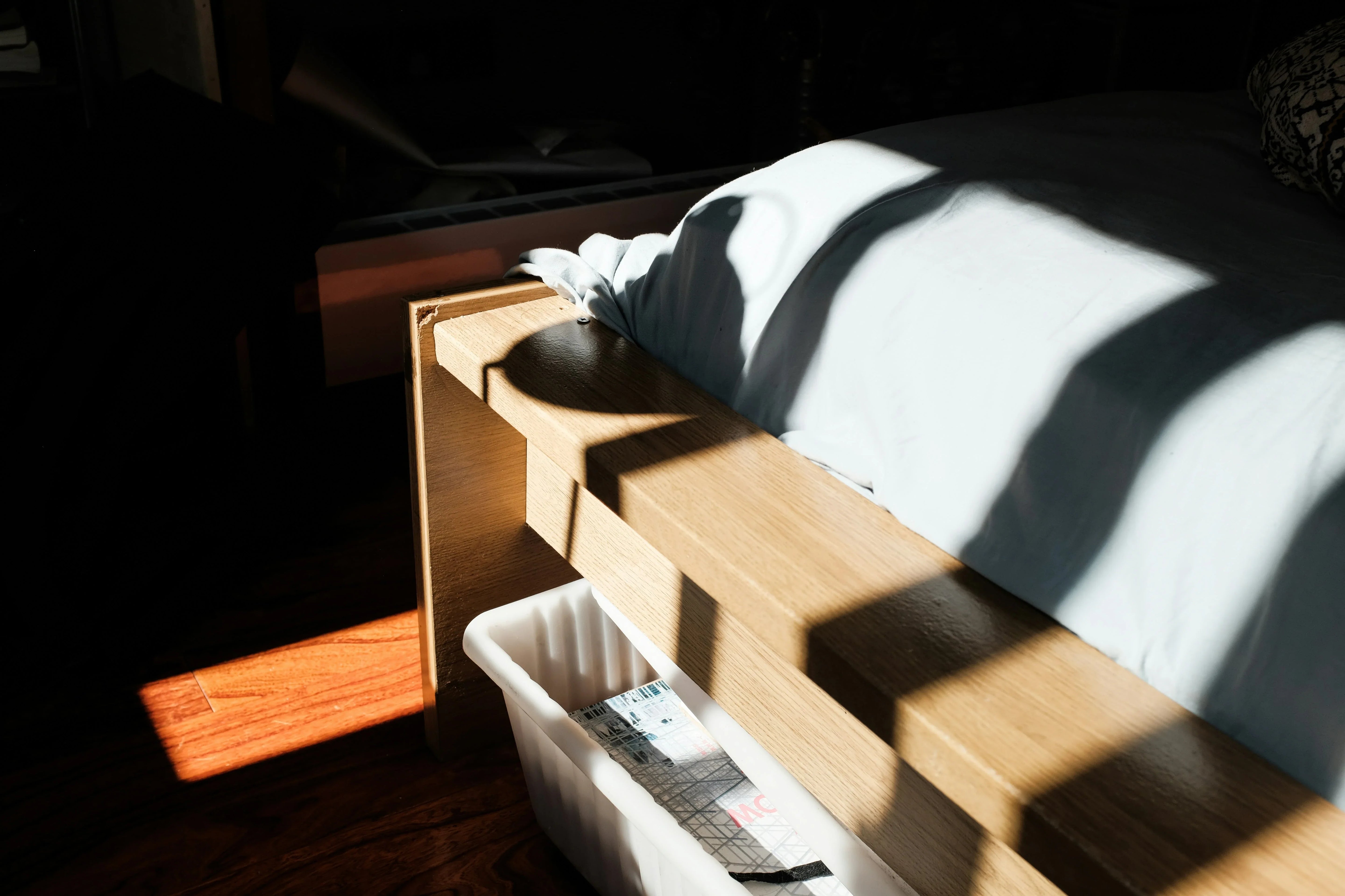 Your Spare Bedding Has Nowhere to Go? Try This Under Bed Storage Trick